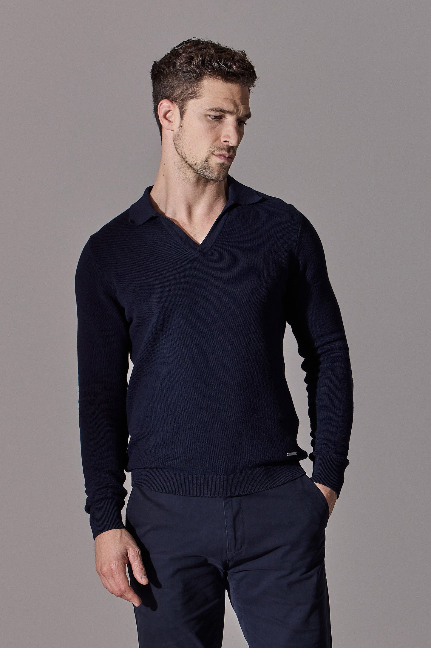 Navy blue polo shirt for men. Open collar, long sleeve. Maklin Clothing