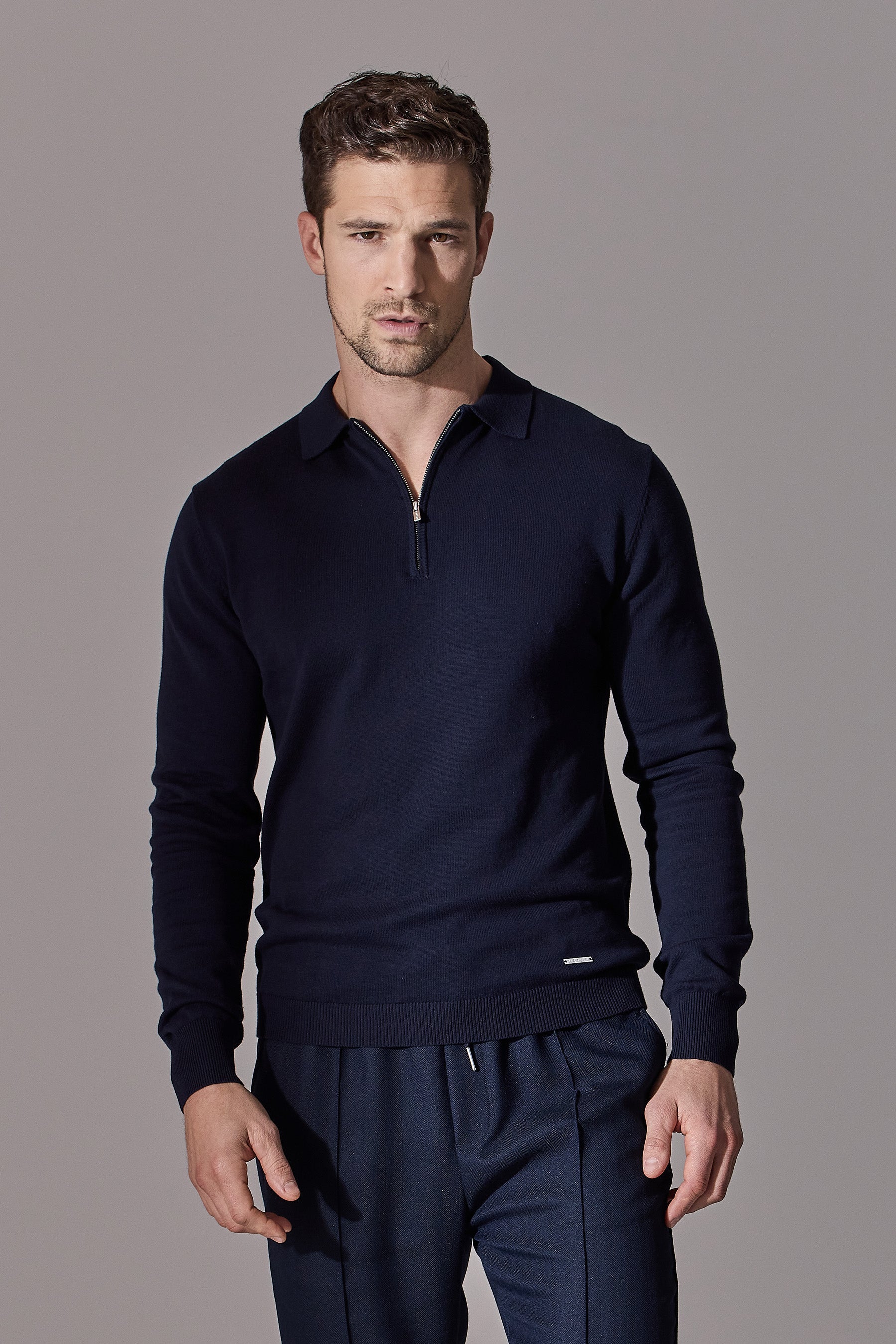 Navy blue long sleeve polo shirt from Maklin Clothing. Zip collar, menswear.