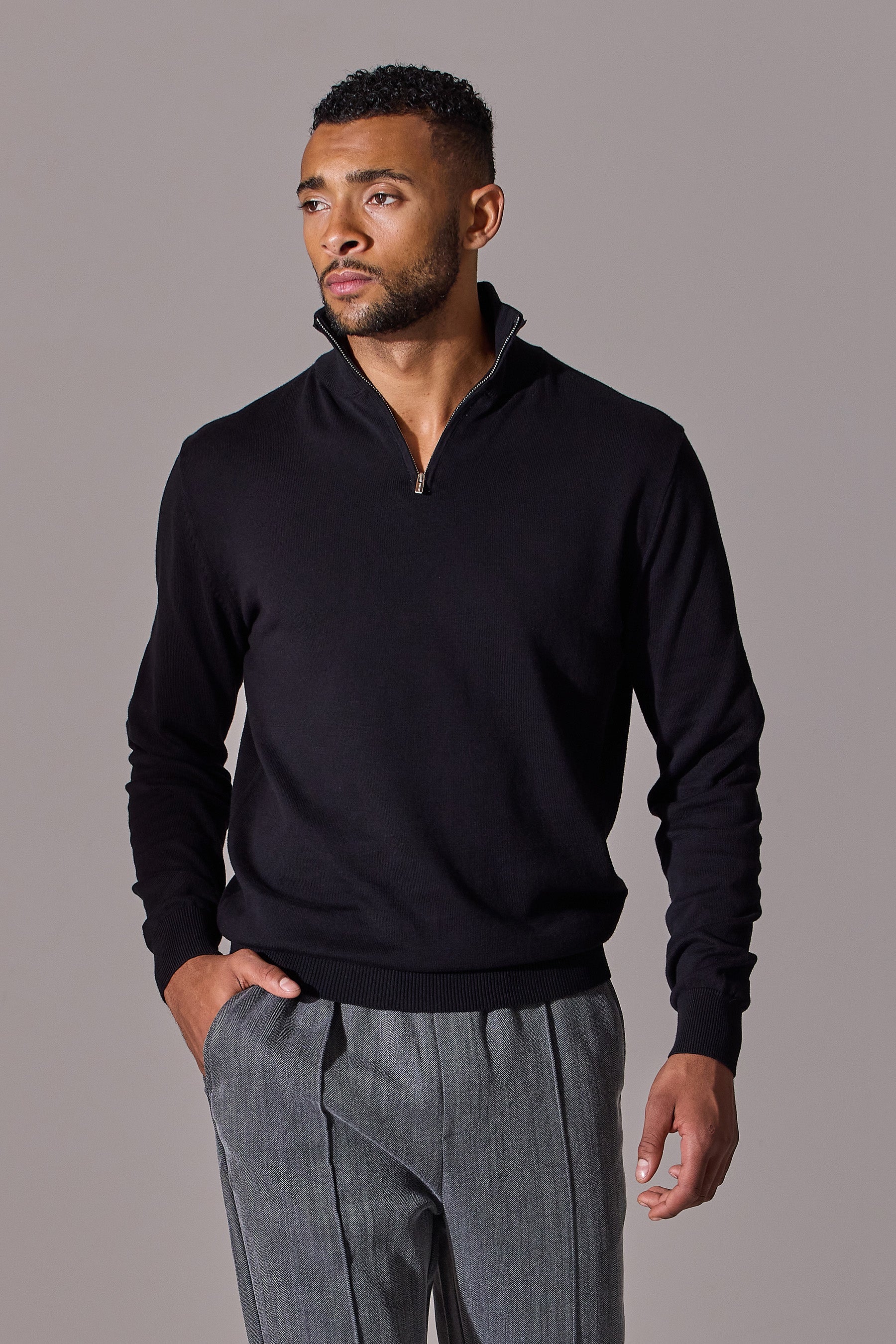 Long sleeve, zip collar, polo shirt for men from Maklin Clothing. Black colour.