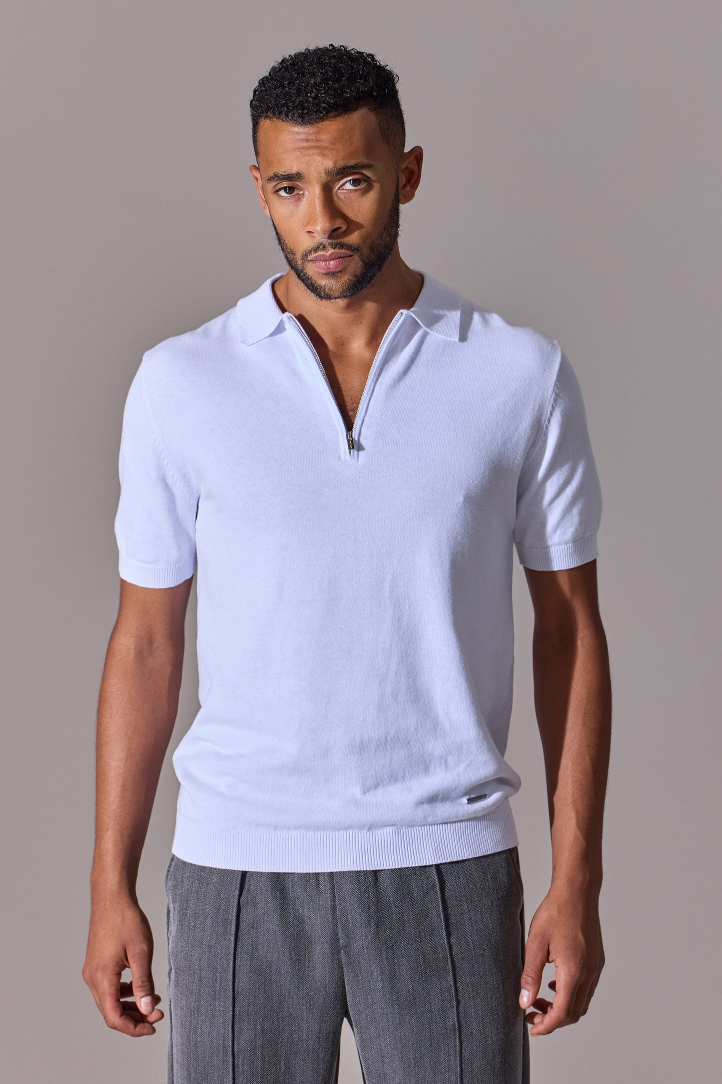 White short sleeve polo shirt for men. Zip collar. Maklin Clothing