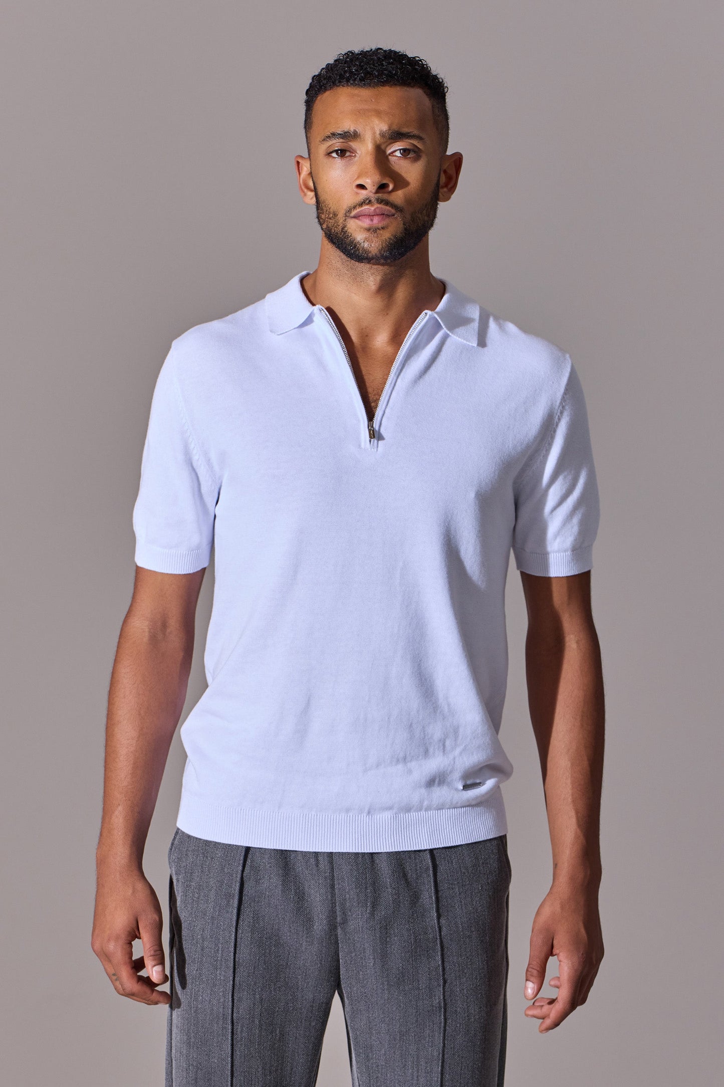 White short sleeve polo shirt for men. Maklin Clothing.