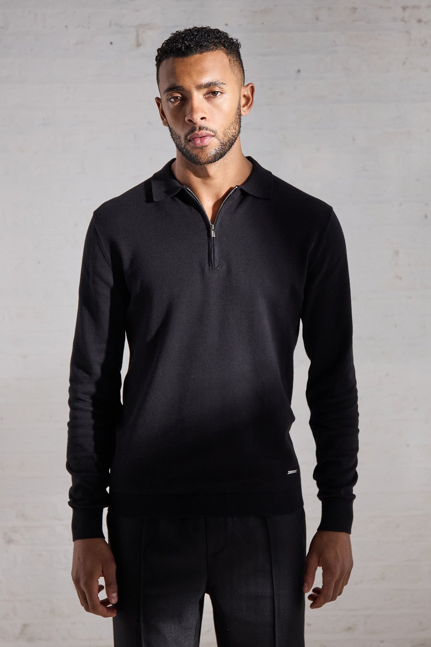 Black polo shirts for men. Long sleeve, zip collar. Maklin Clothing, menswear.