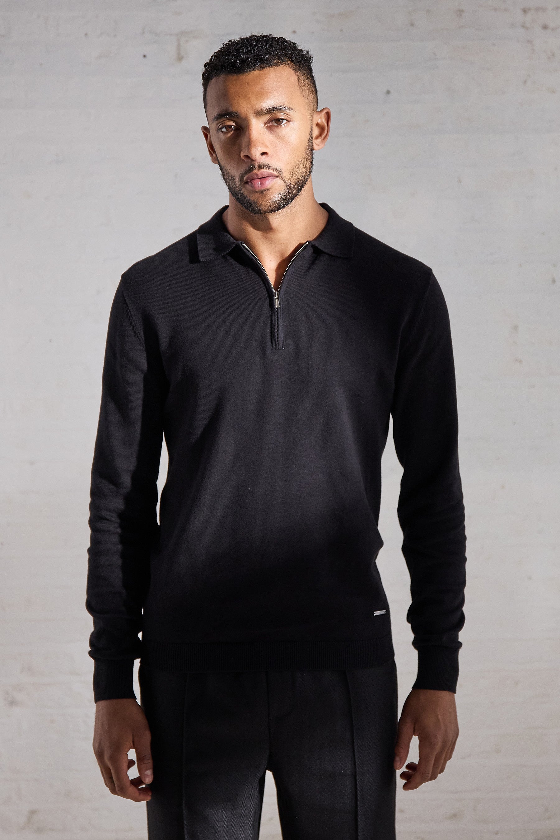 Black polo shirts for men. Long sleeve, zip collar. Maklin Clothing, menswear.