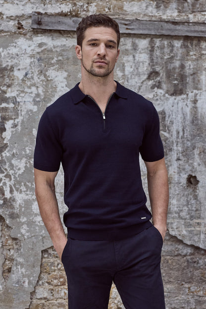 Maklin Clothing's navy blue polo shirt for men. Featuring short sleeves, zip collar.